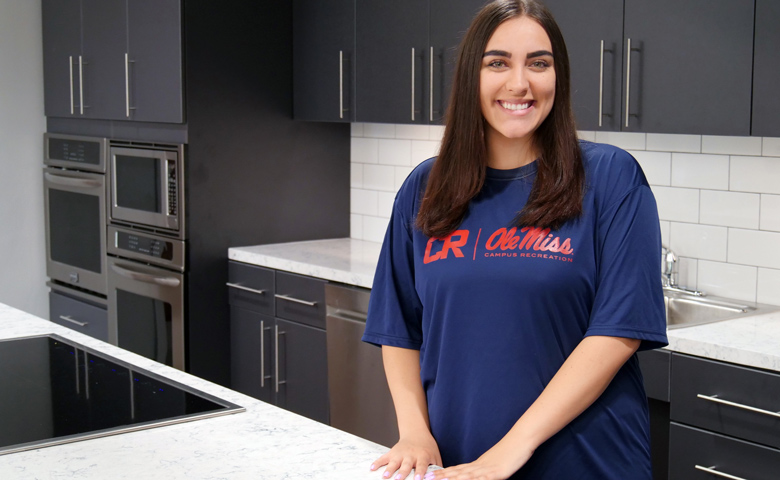 Ole Miss student Maddie Marine of Newport Beach, California, made a gift of $25,000 and a commitment of time to support the new William Magee Center for Wellness Education. The senior, pictured here in the demonstration kitchen, is dedicated to the overall mission of the Magee Center.